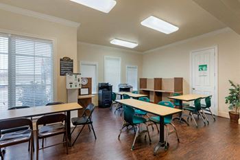 Resident activity center with tables and chairs